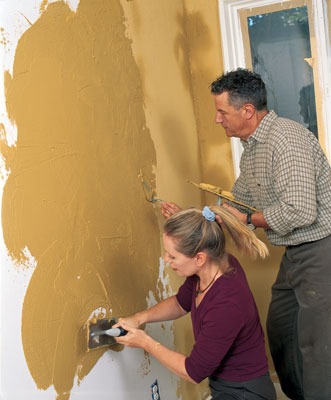 
Terramed natural ochre plaster is so simple and nontoxic that even the kids can get involved in prep work. Stacey helps mix a batch of Golden Wheat color Terramed that will bring a soft, honey color into the bedroom. The rich tint adds more warmth than a ­neutral color without overpowering this small room.
